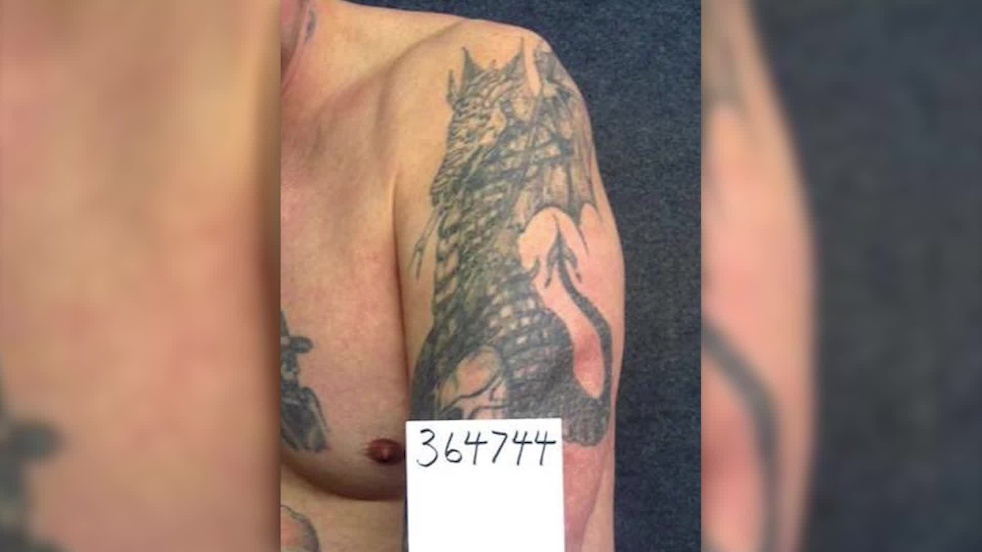 Distinctive tattoos of escaped inmate Curtis Ray Watson, a person of interest in death of prison employee