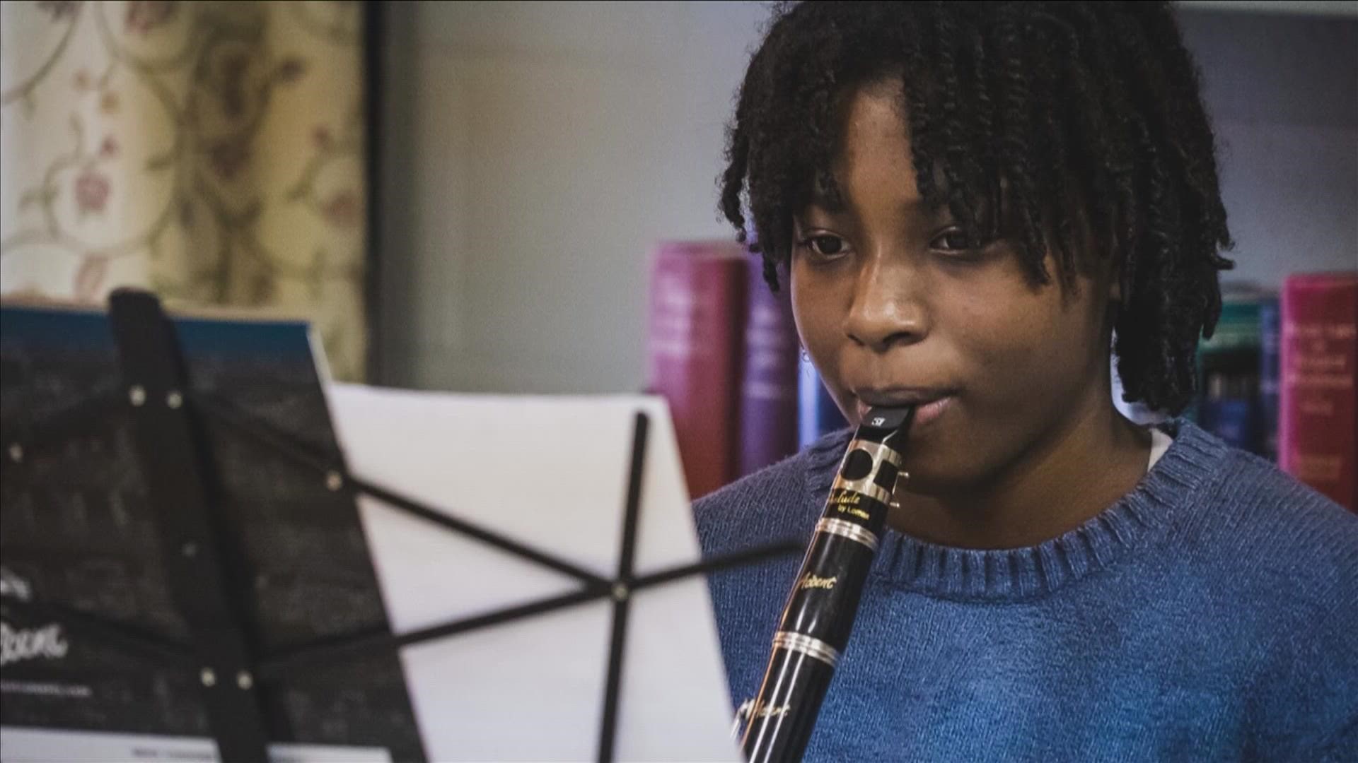 Kids as young as five are learning how to play musical instruments through the program.
