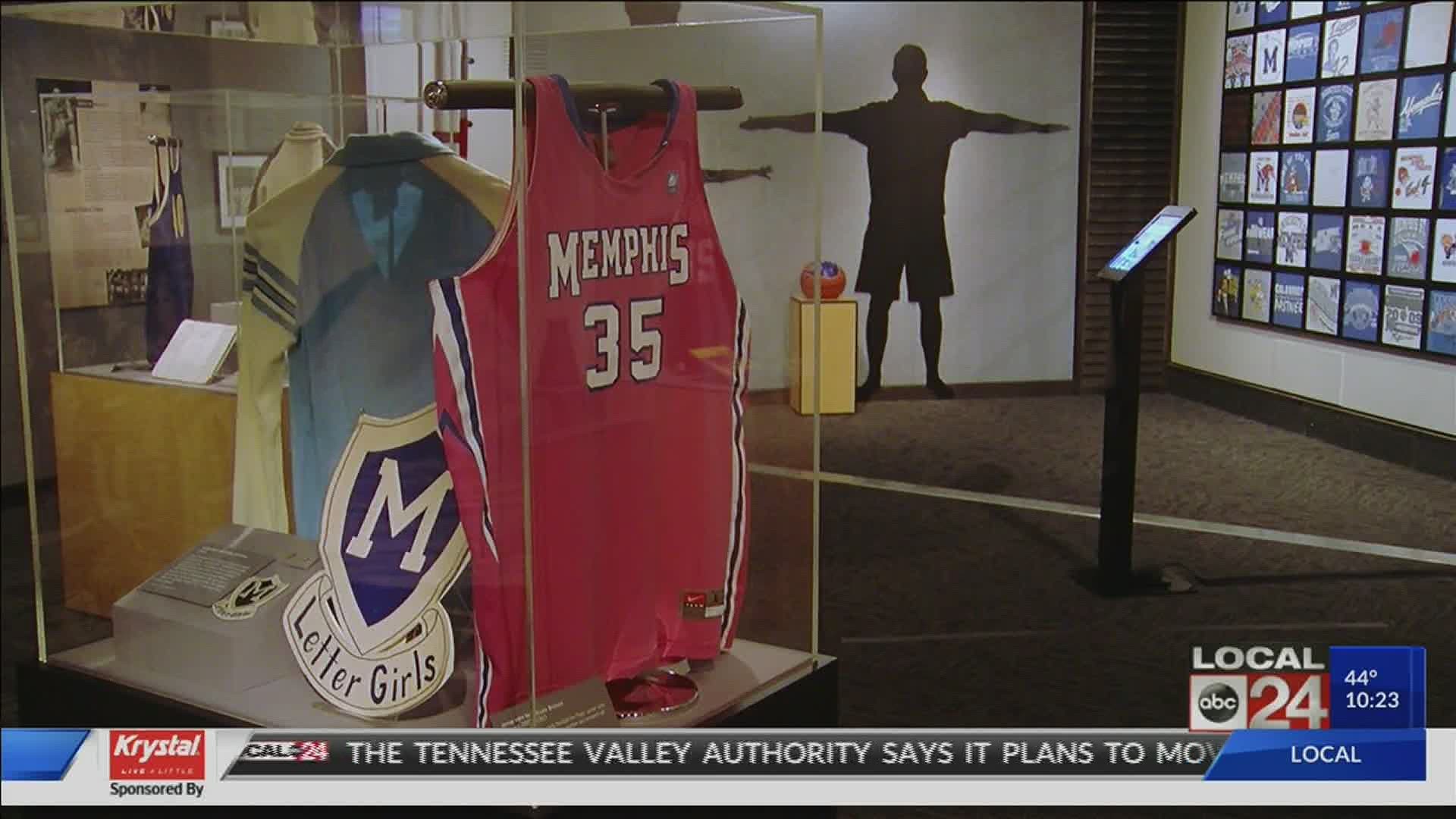 Exhibit includes memorabilia, photos, and artifacts from Memphis Tiger fans, former players, and coaches.