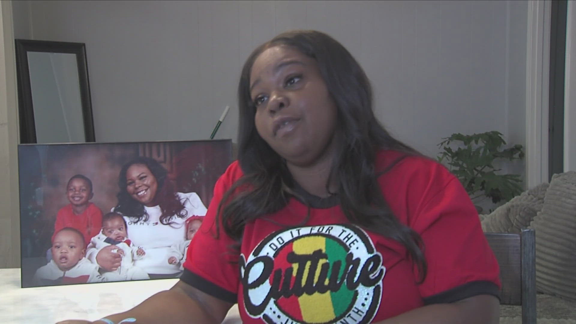 Pepper Baker talks with the mother of four children who were all shot in a road rage shooting on I-240 last week.