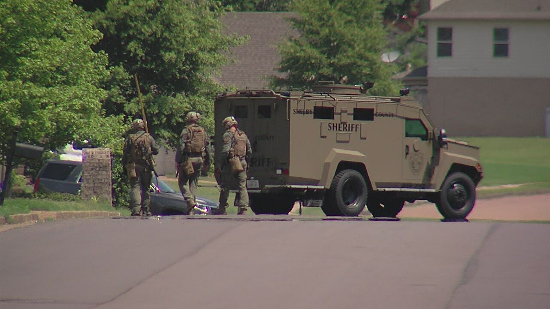 Shelby County Sheriff's Office says someone, possibly armed with a weapon, barricaded in a home.