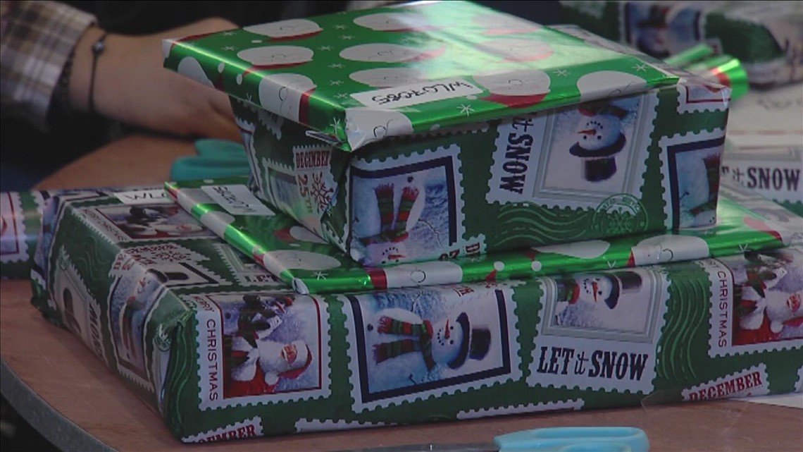 It's a wrap! Memphis Tigers host wrapping party for gifts for Youth Villages children