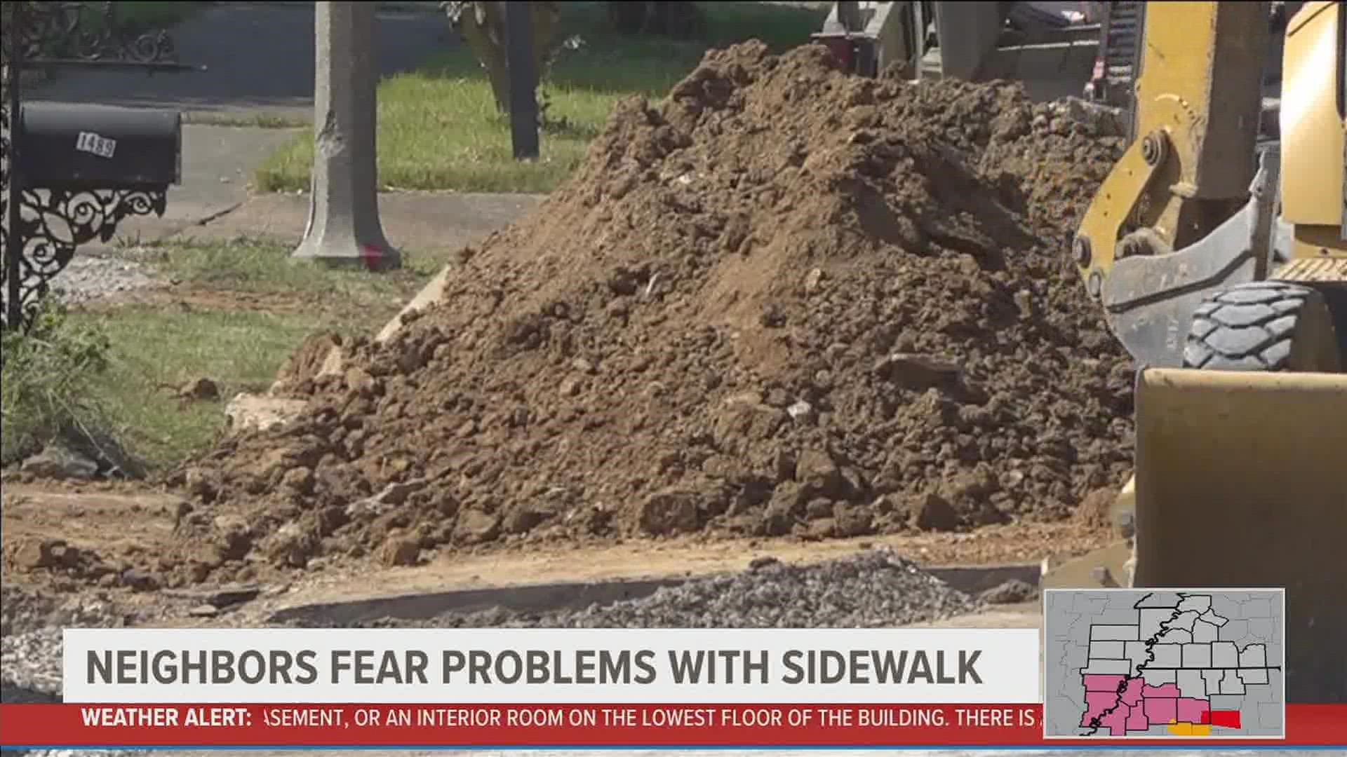 Community members in the Alcy-Ball neighborhood said they've watched the sidewalks in front of their homes crumble.
