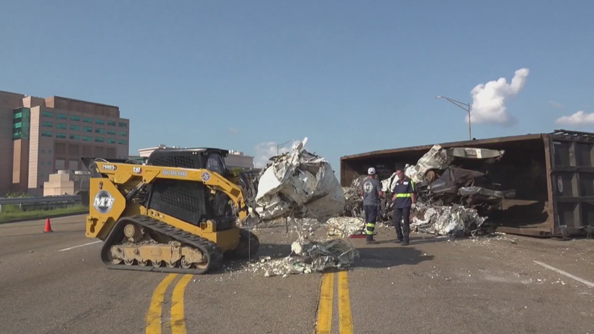 The driver said that the crash destroyed nearly 80,000 pounds of scrap metal. 