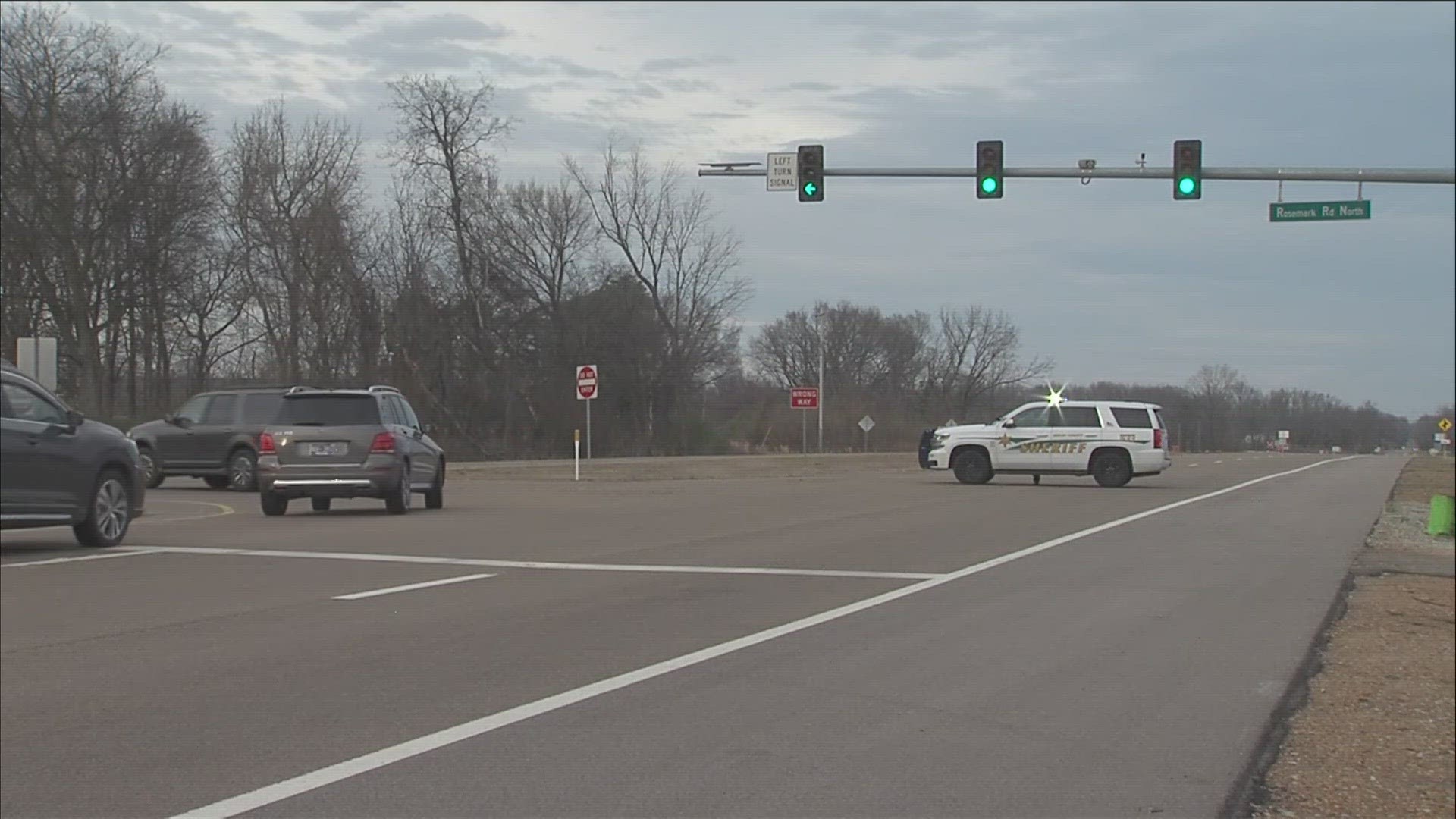 One person is dead after a three-car crash with a tractor trailer, with at least one car catching fire in Northeast Shelby County.