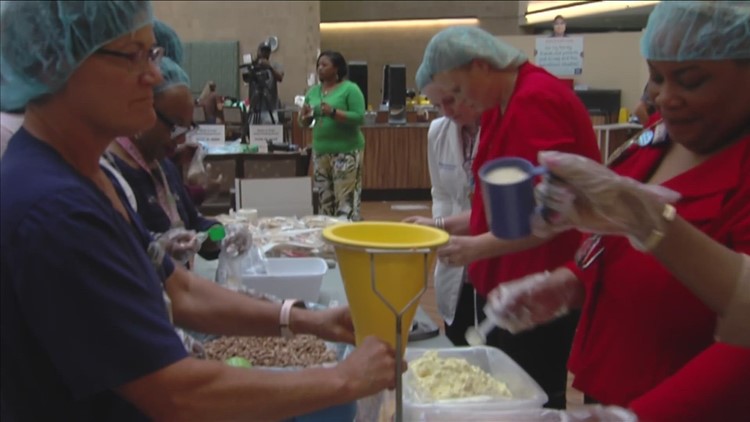 Regional One employees volunteer to pack 15,000 meals