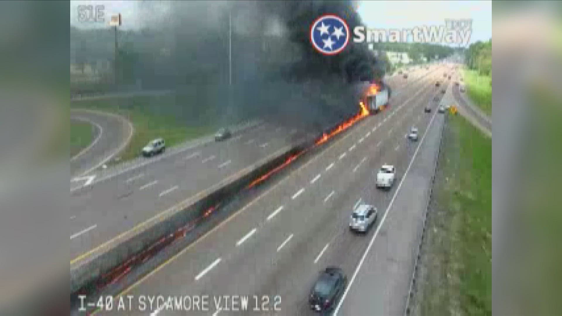 An 18-wheeler crashed into an interstate median around 4 p.m., leaving behind a trail of fire, Tennessee Department of Transportation cameras showed.