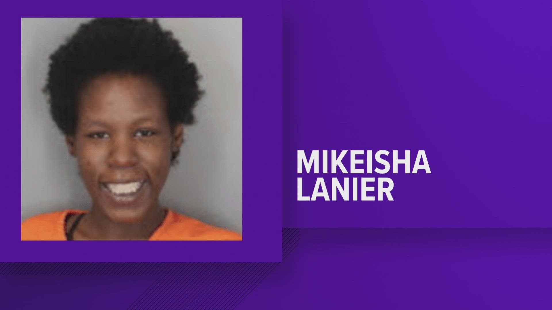 Police said a witness heard Mikeisha Lanier say, “Let me go before I shoot this place up" while picking up her child at Sheffield Elementary School.