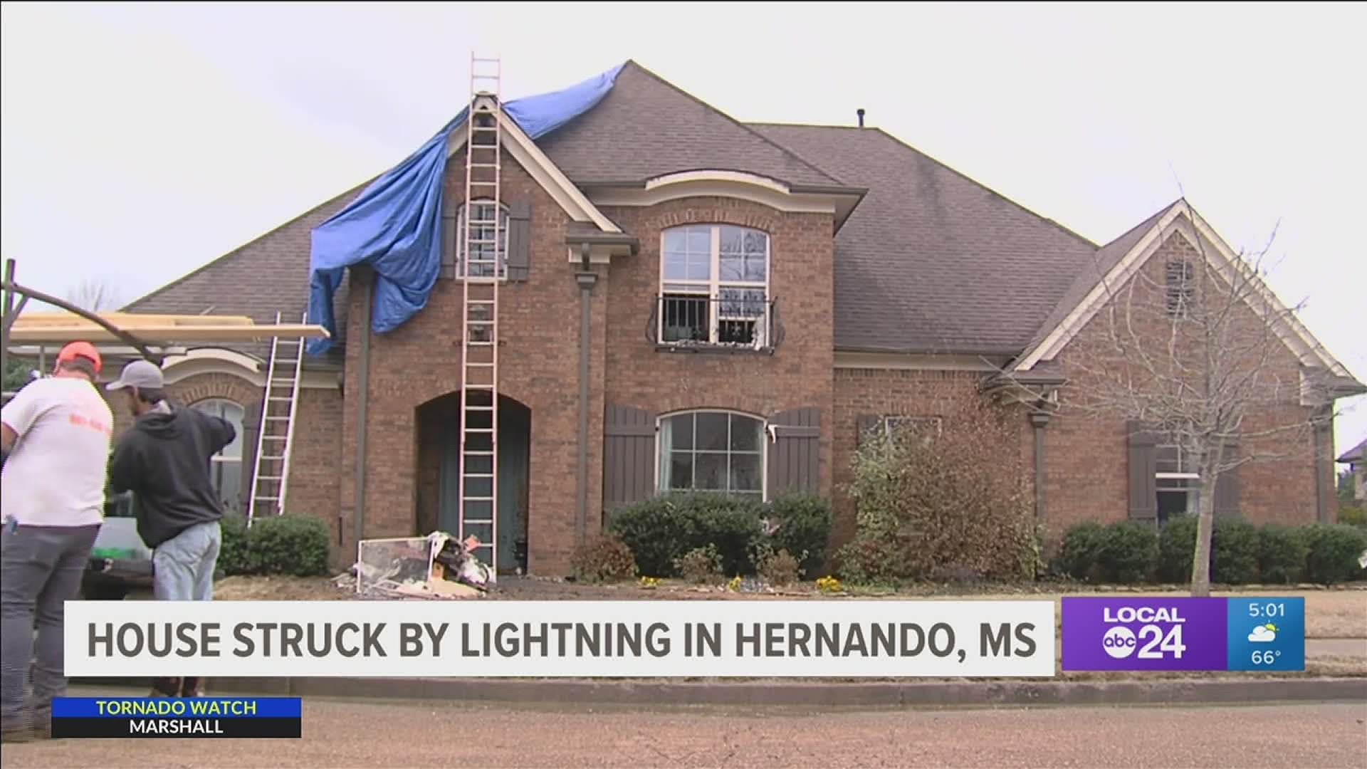 The lightning strike caused a fire in the attic and left an 8-foot wide hole in the roof.