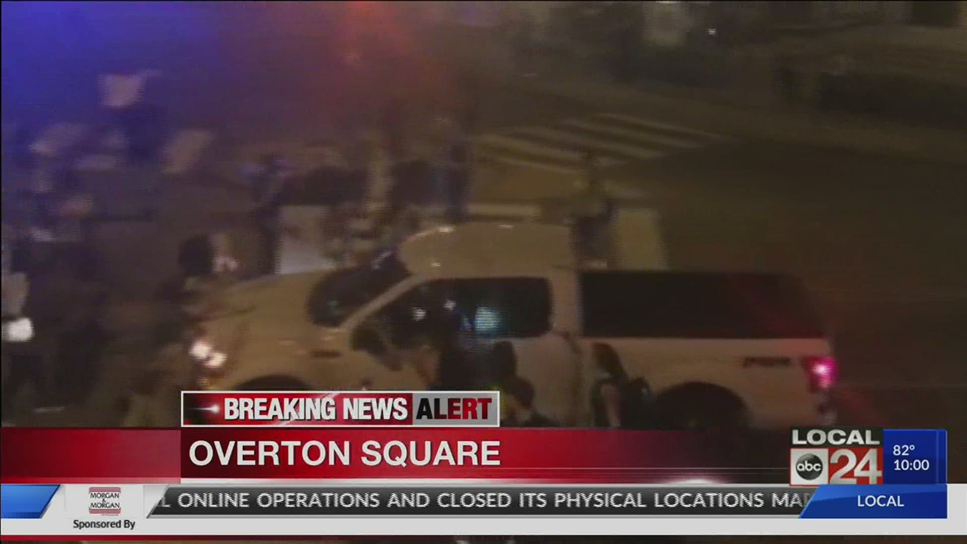 protesters hit by driver in overton square