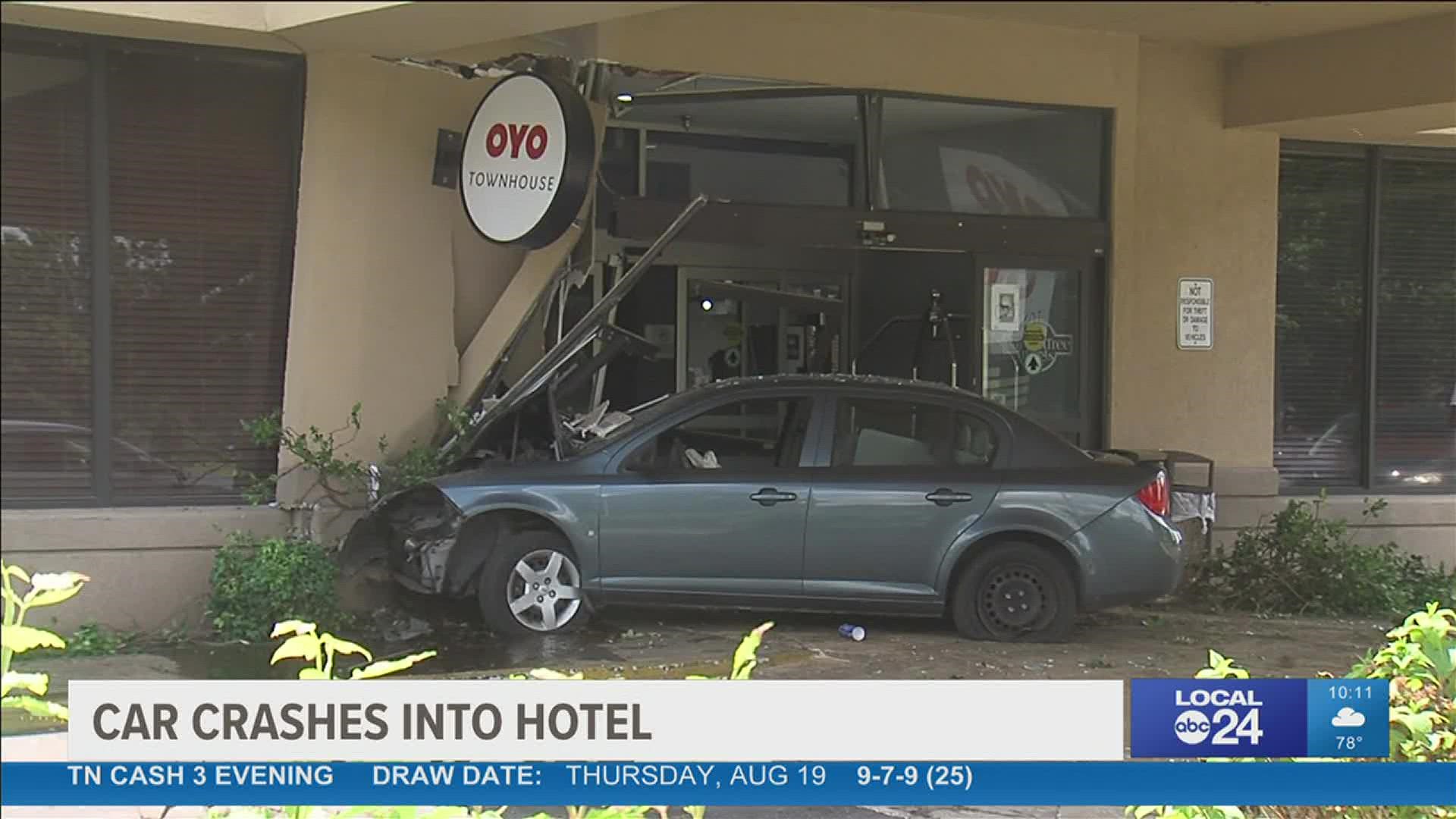Damage to the front of the hotel and the 4-door sedan that smashed into it could be seen from the road.