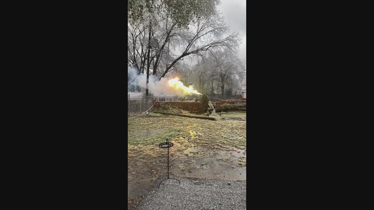 Sparks fly after tree falls during ice storm 2022 in midtown Memphis