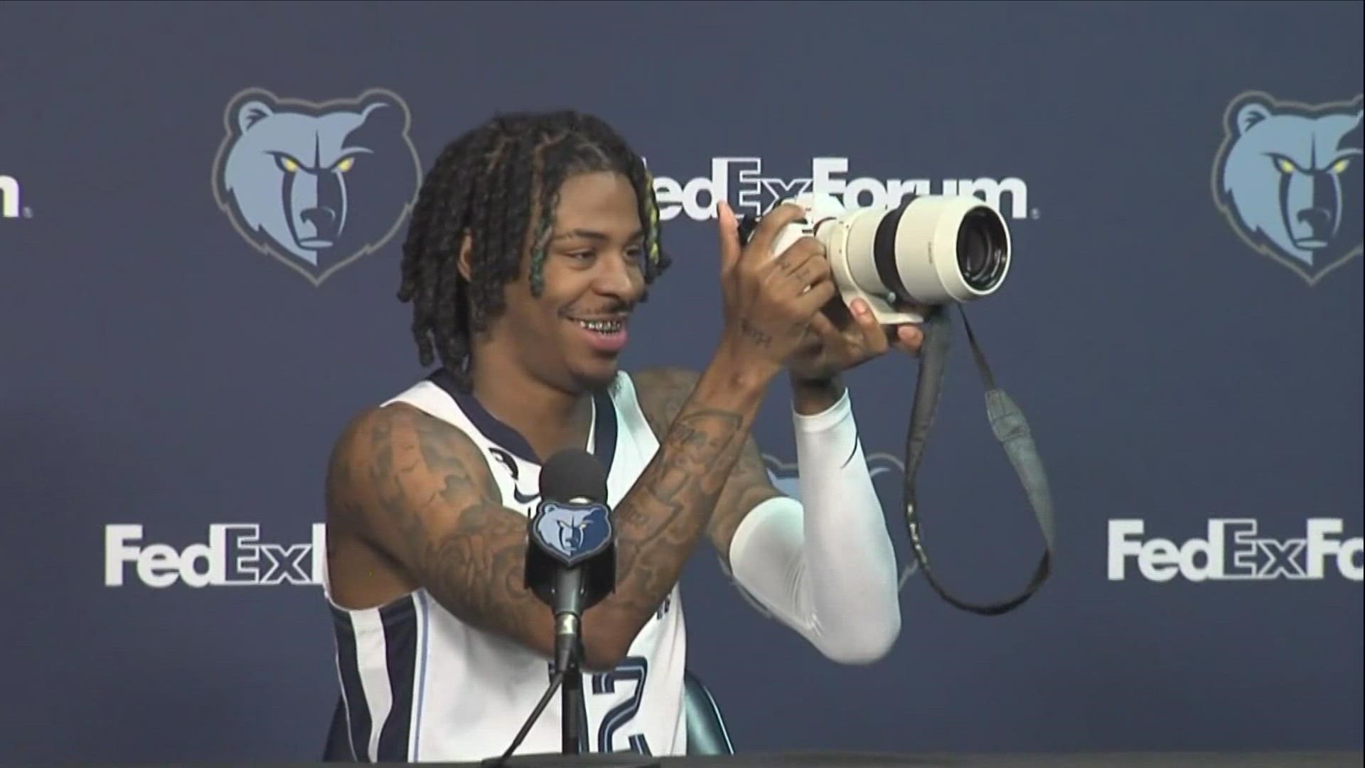 Grizzlies superstar Ja Morant speaks with the media during Memphis Grizzlies Media Day 2022, showcasing his camera skills to boot.