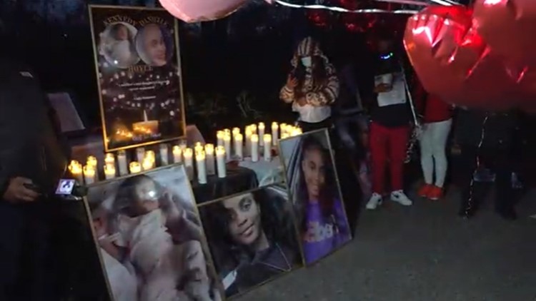 Loved ones honor Danielle and Kennedy Hoyle during a candlelight vigil