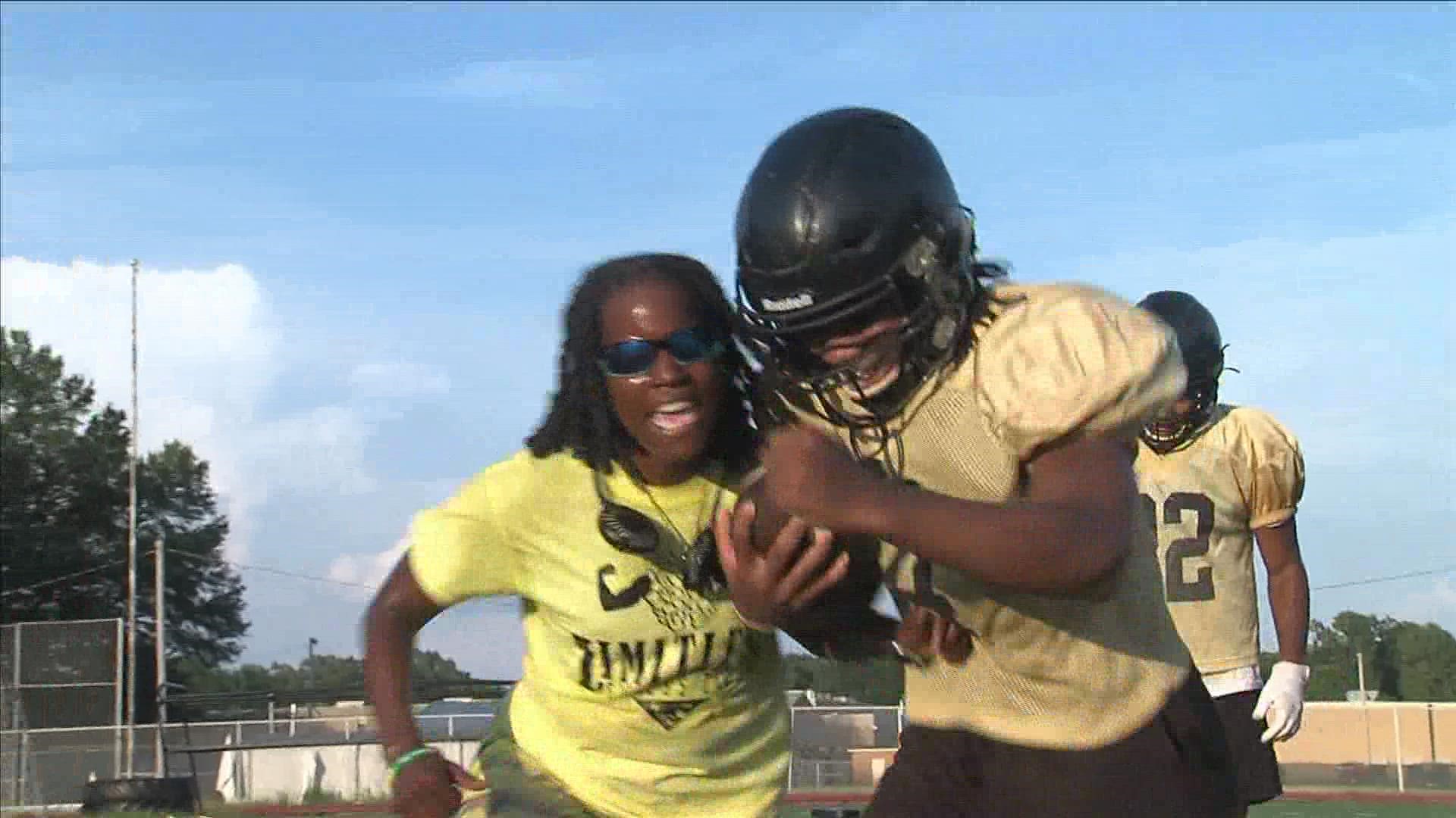 Burse, a Whitehaven alum, is in her first season as the Tigers running back coach.