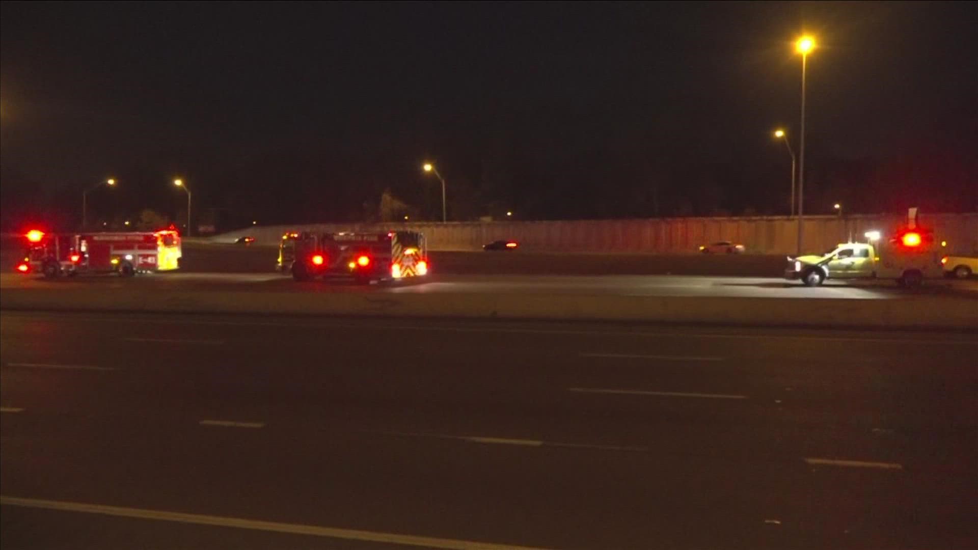 The busy freeway was blocked off for more than an hour after officers responded to the crash.
