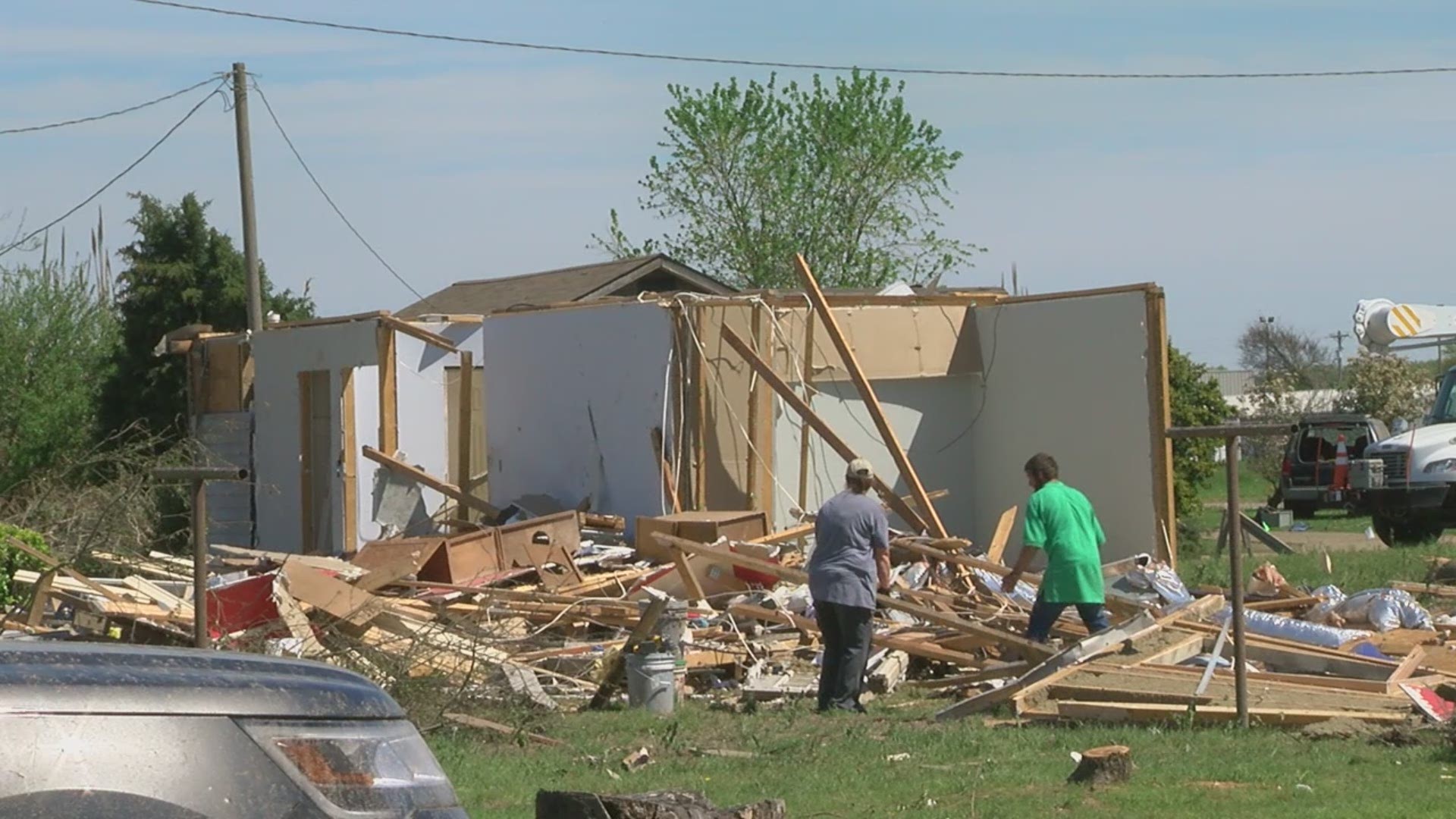 A tornado seen on the ground causes damage Wednesday night in Northeast Arkansas.