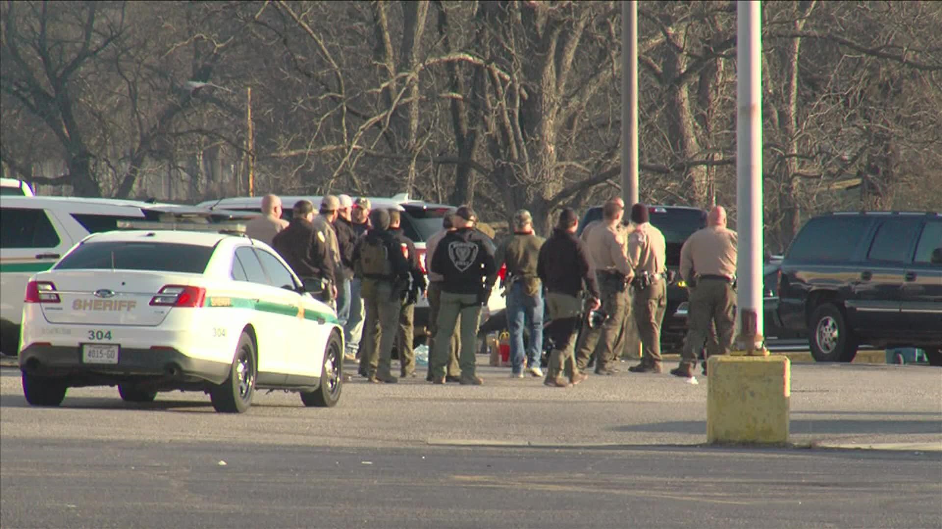 Tipton County Sheriff Shannon Beasley said the suspect made no demands, but "assured that no one would make it out or inside alive."