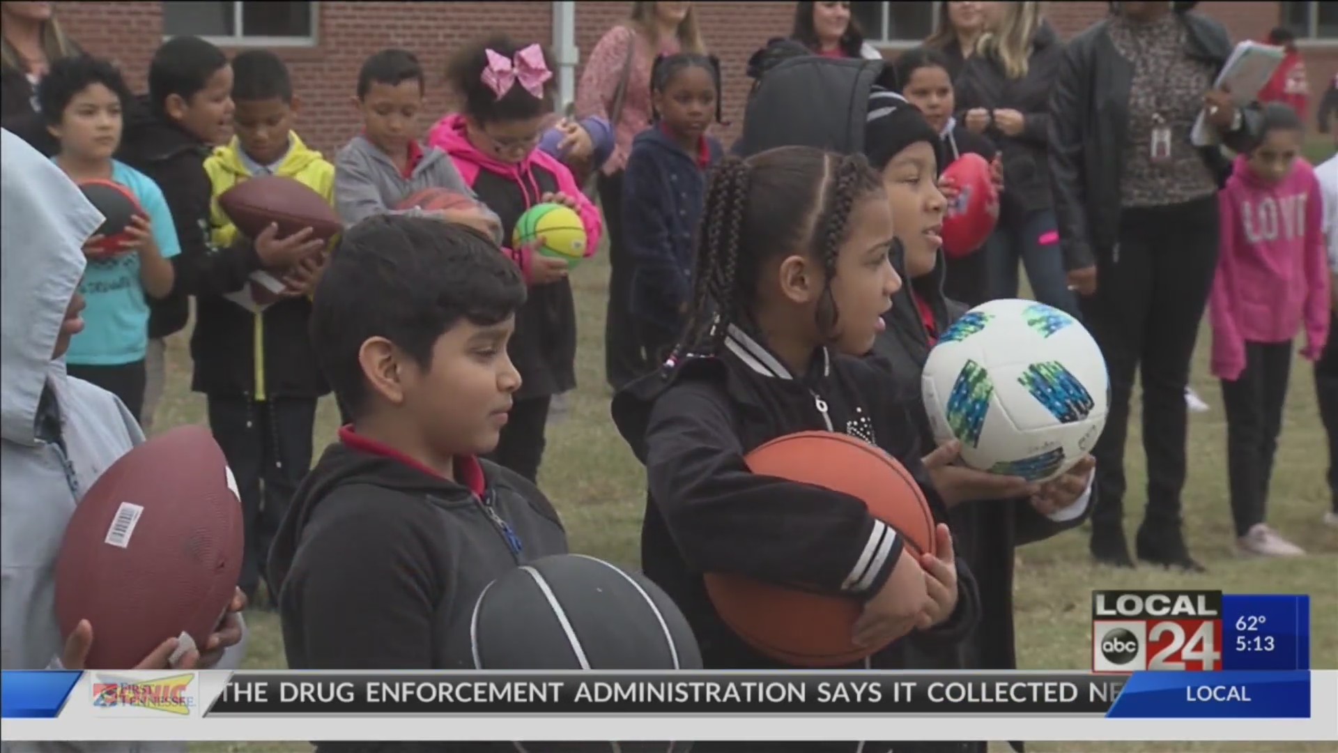 Hundreds of new sports balls donated to Wells Station Elementary School