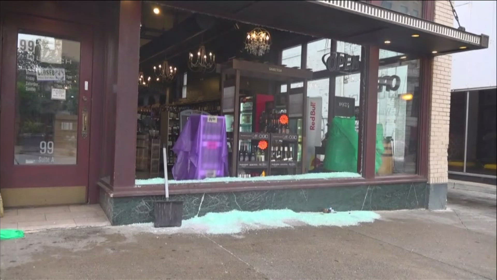 MPD said when officers arrived at the liquor store, the store's front glass window was shattered, and bottles of liquor were scattered up and down the sidewalk.