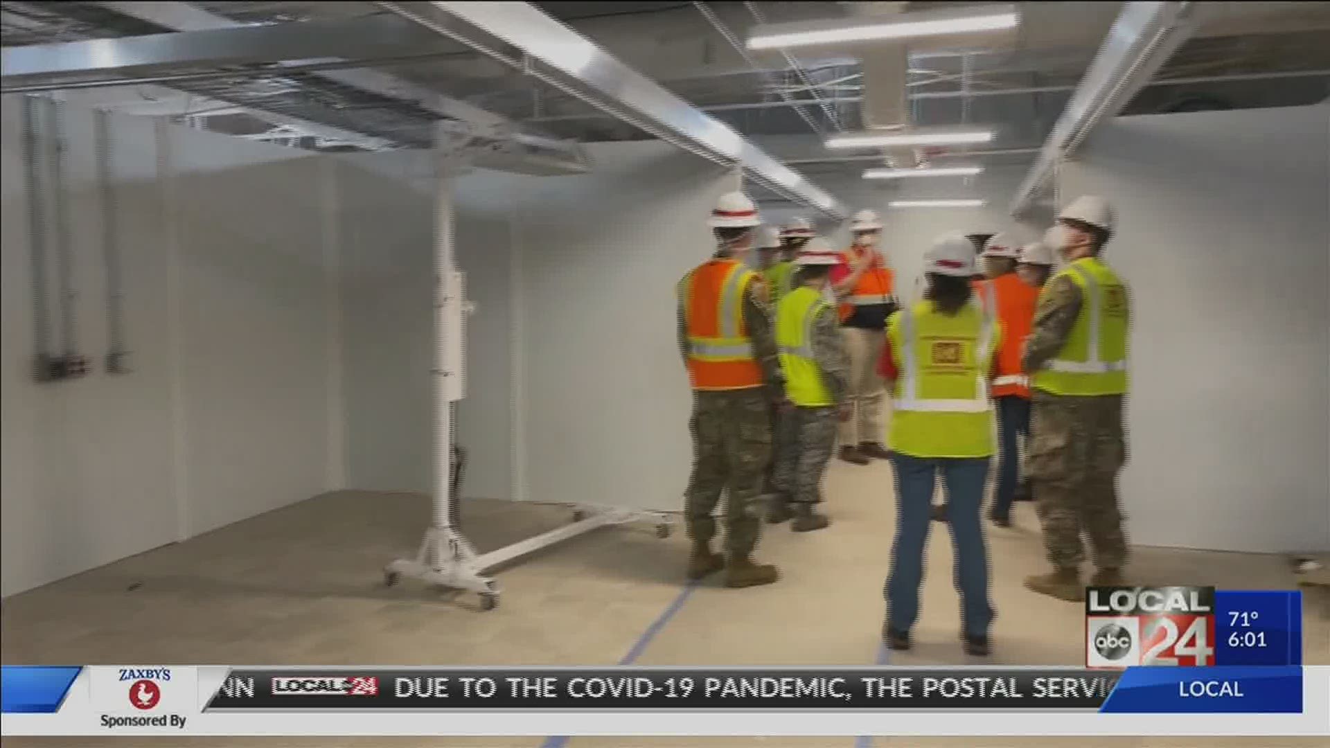 An overflow hospital being constructed at the old Commercial Appeal building is nearly complete as the county begins to reopen businesses.