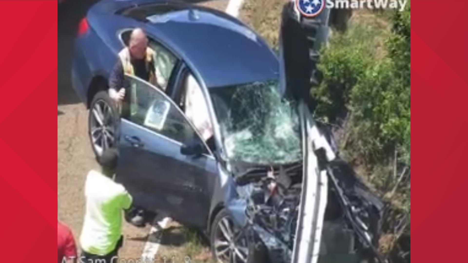 A Chevrolet Malibu, involved in a hit-and-run, can be seen spinning out and crashing into a guardrail on I-240 eastbound on Saturday, May 4.