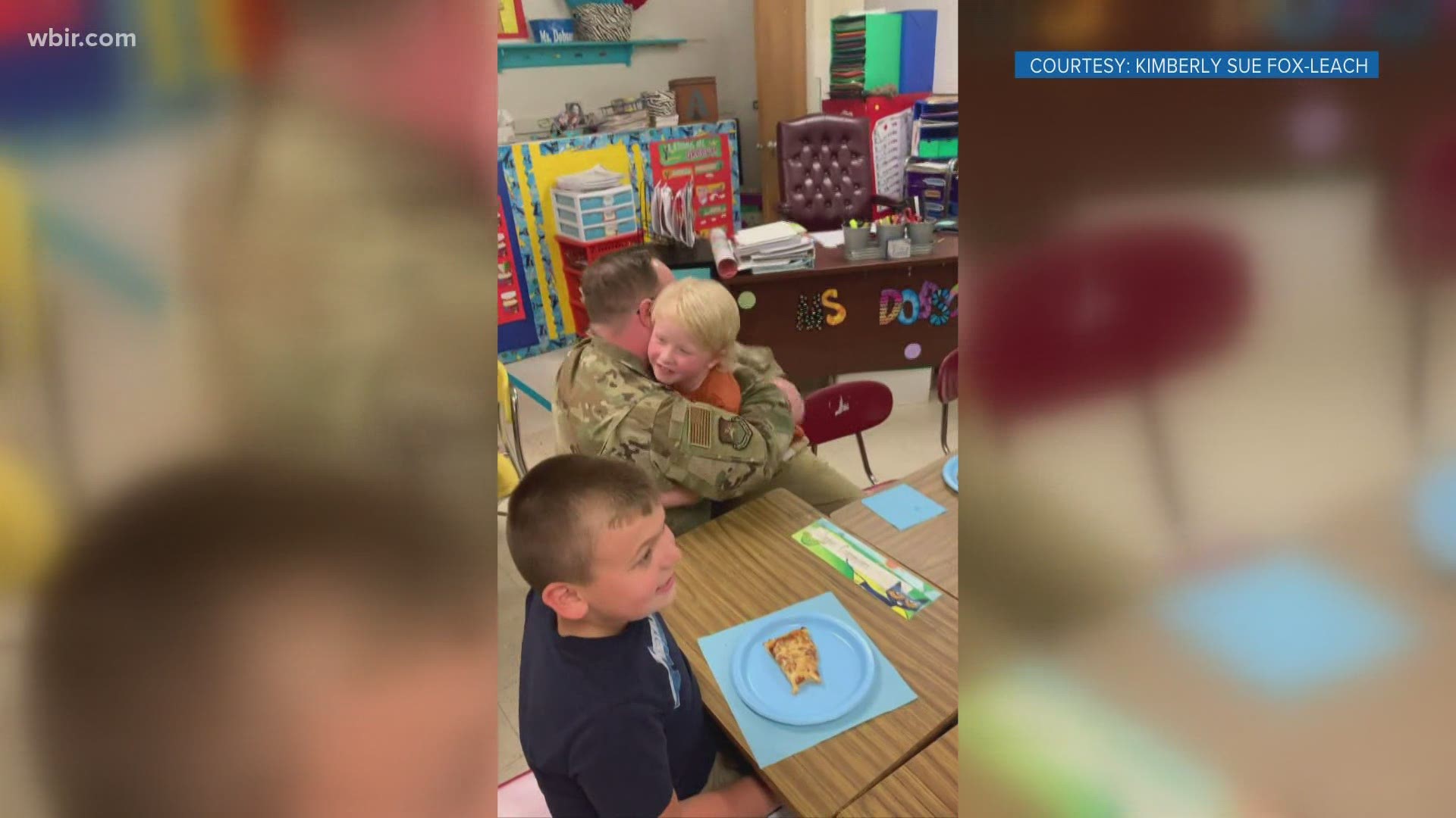 The father made his way home just in time to surprise his 6-year-old son Charlie as his class celebrated the end of the school year with a pizza party.