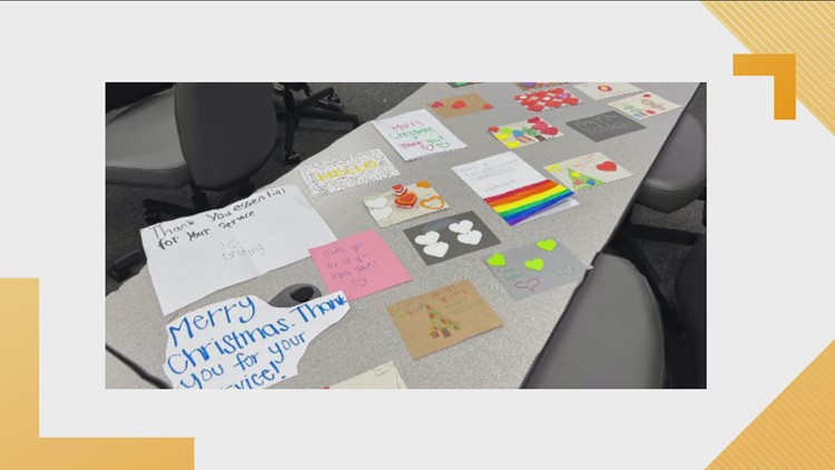 Emerald Academy delivers Christmas cards to KCSO deputies