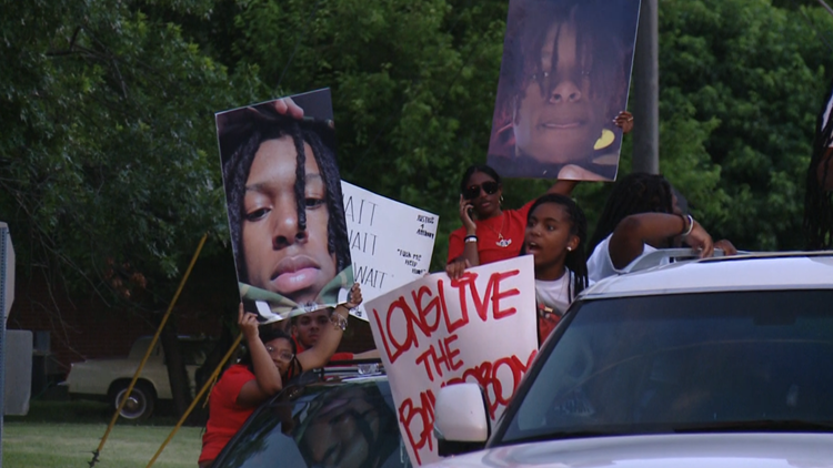 Dozens gather for march downtown to remember Anthony Thomspon Jr.