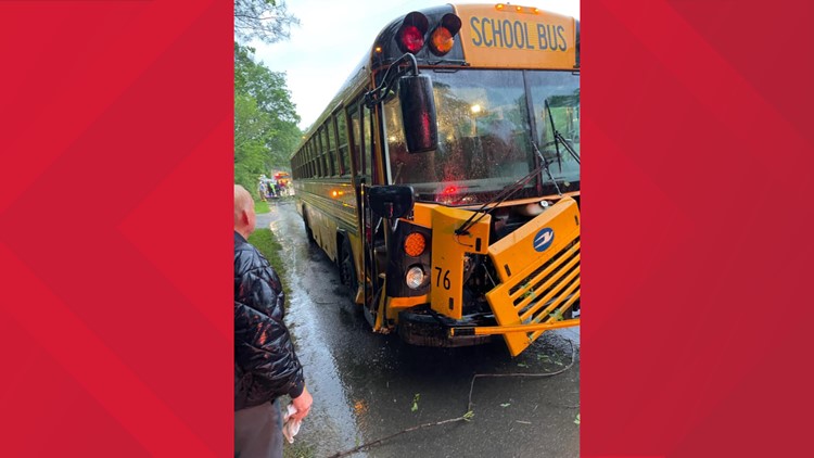 Students, driver OK after bus struck by tree limb, officials say