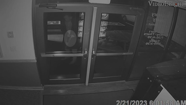 Security camera video appears to show former McCreary County Schools Superintendent with gun on school property