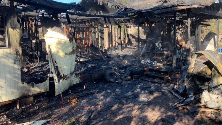 Fire destroys abandoned Mascot house, people seen running from it as flames spread