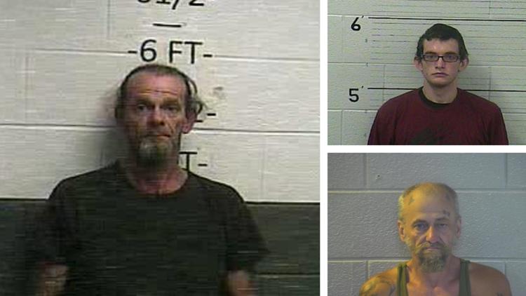 Kentucky police arrest three people on murder charges after finding human remains on forest road