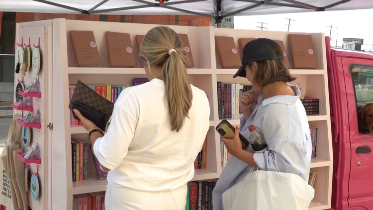 Pink bookmobile bringing modern romance novels to customers around Knoxville