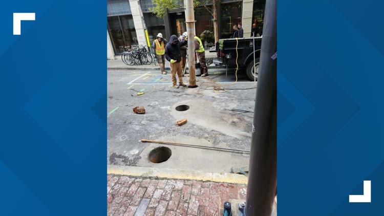 Crews to install new retractable, metal bollards being installed near Market Square