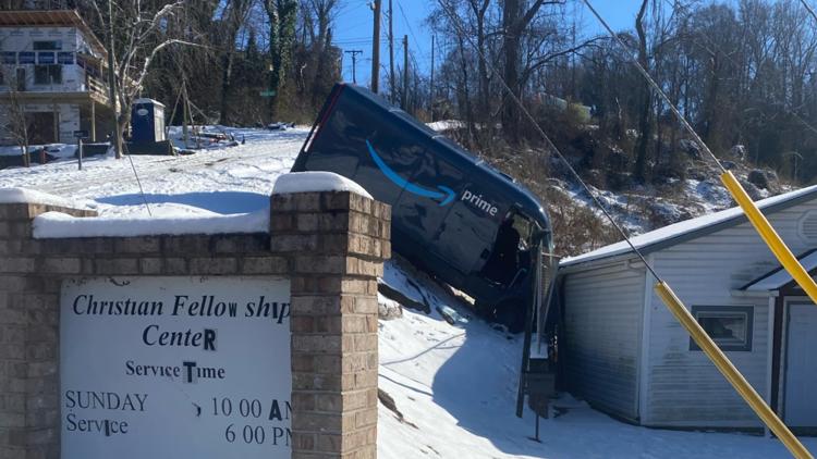 Amazon delivery van slides on icy slope and crashes into building; no injuries reported, KPD says