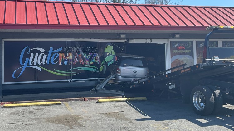 KFD: No injuries reported after car drives through North Knoxville restaurant