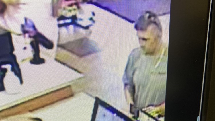 Knoxville police searching for man accused of robbing a 92-year-old woman outside her home