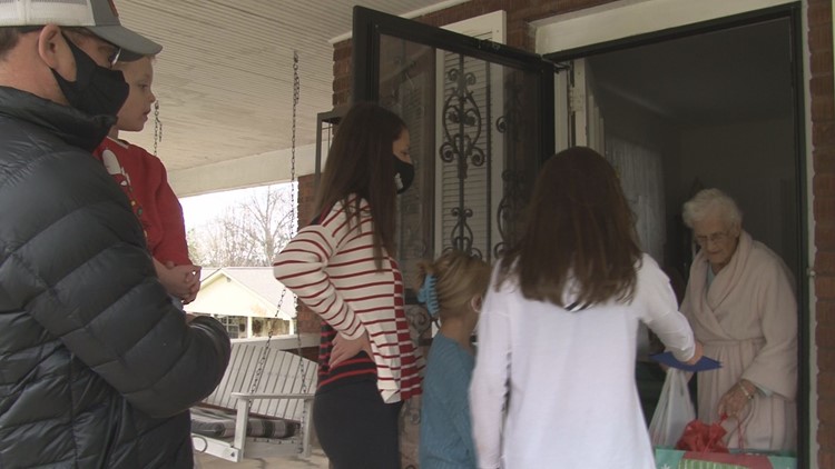 Mobile Meals volunteers deliver gifts and hot meals to homebound seniors on Christmas