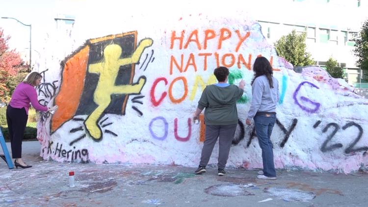 UT students paint The Rock for National Coming Out Day