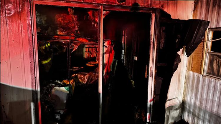 Three injured in Halls mobile home fire