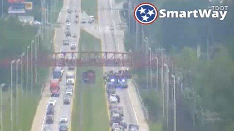 Emergency vehicles blocking Southbound Alcoa Hwy. south of airport near pedestrian bridge to respond to incident