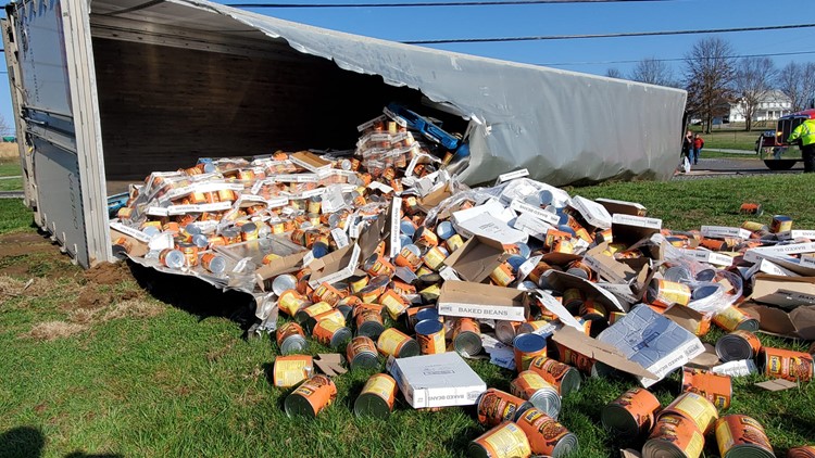 Spilling the beans: Truck full of baked beans flips on Newport Highway