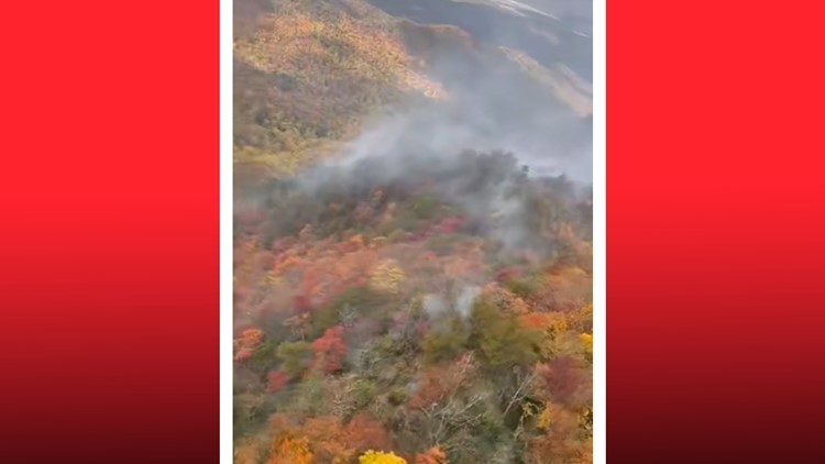 Western North Carolina wildfire continues to expand as crews work to contain it and protect structures