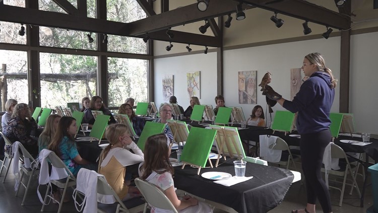 Knoxville community paints with Jack the owl at Ijams