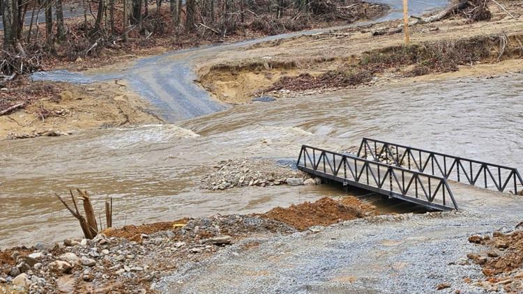 2 temporary bridges withstand flooding in Carter County, road to one washes out