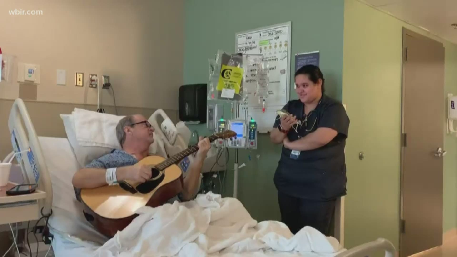 A longtime guitarist decked the halls with "O' Holy Night," singing along with a nurse in a hospital.