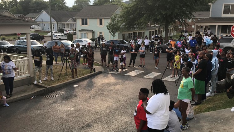 Knoxville community holds candlelight memorial to remember shooting victim John John Mathis