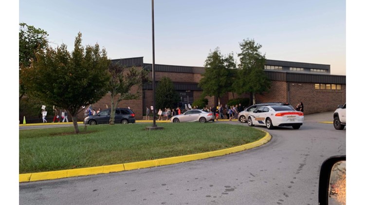 Protesters gather outside some Knox County Schools over mask mandate