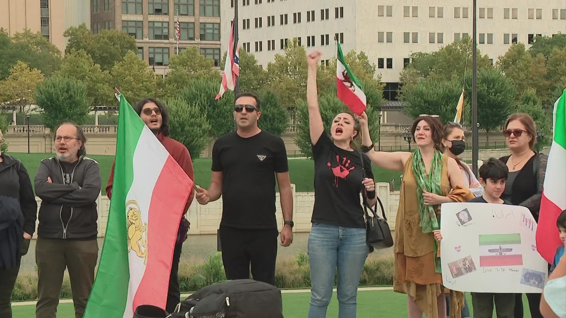 Dozens rallied in downtown Columbus Saturday in response to violence, protests and internet blackouts that have erupted in Iran.